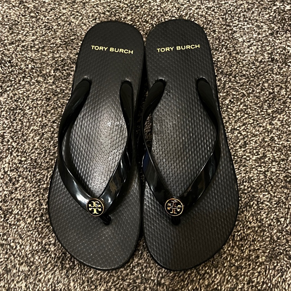 Tory Burch Black Flip Flops with Gold Logo Accent